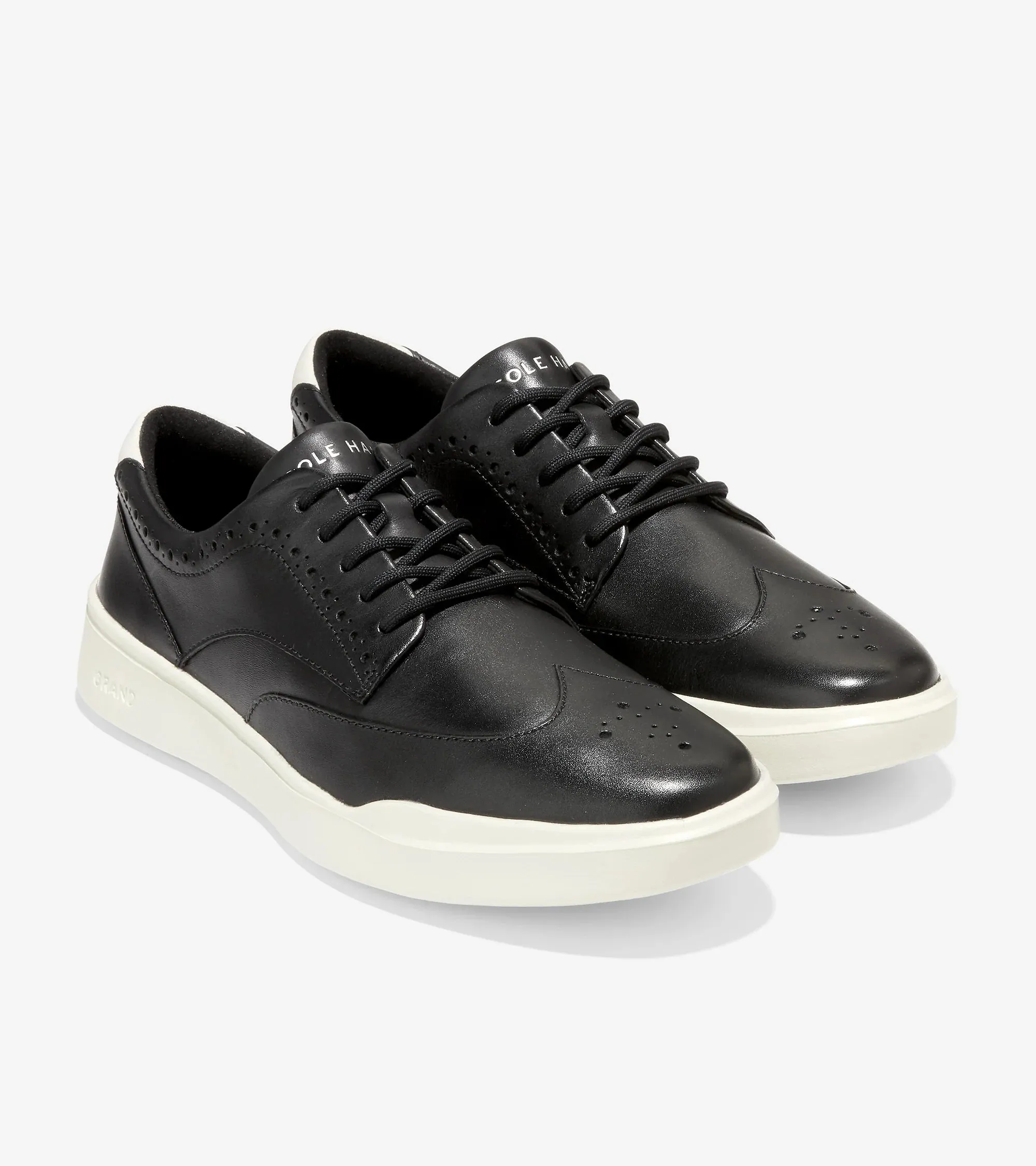 Cole Haan Men's Grand Crosscourt Wing Tip Sneaker Black/Blanc De Blanc C36068
