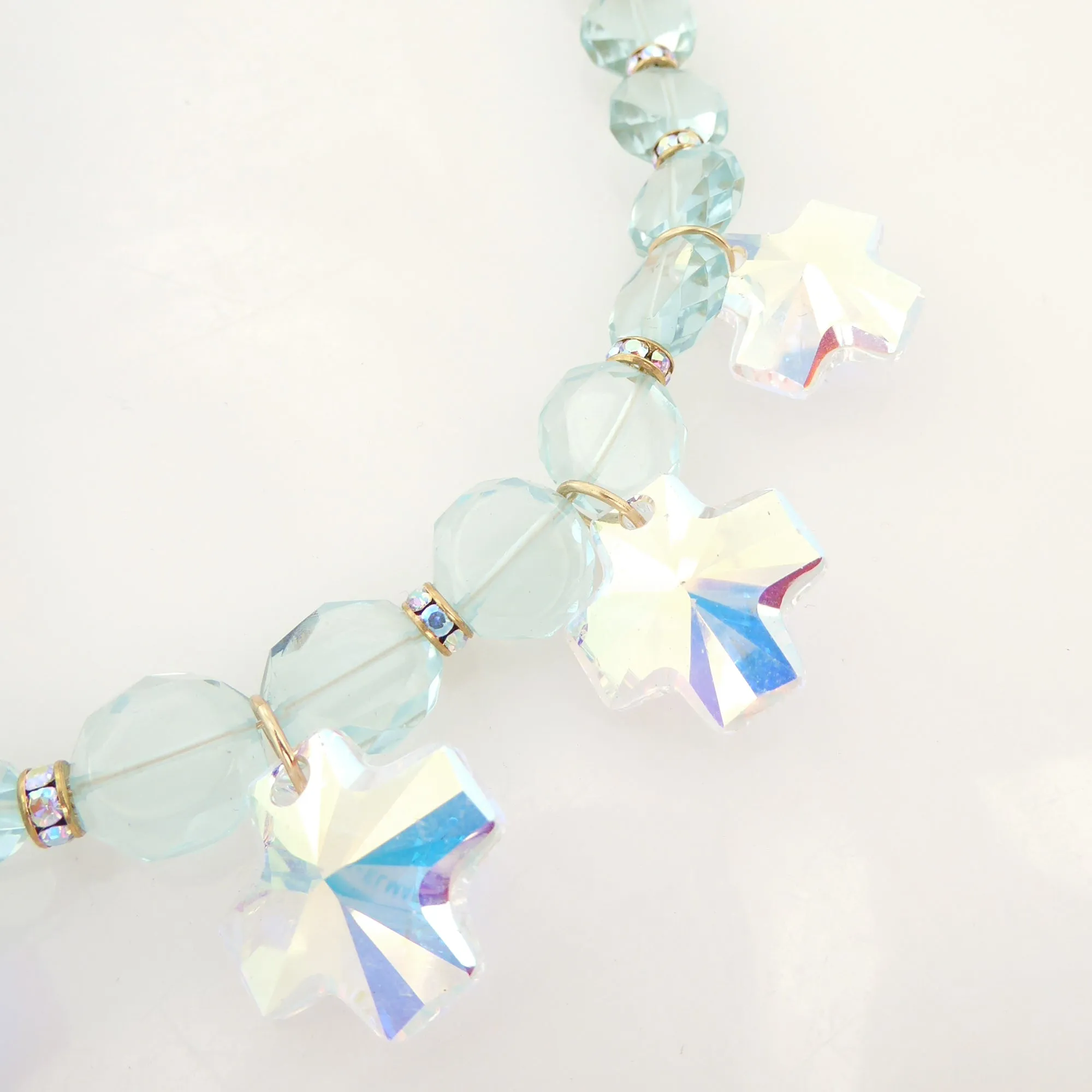 Iridescent crystal cross necklace