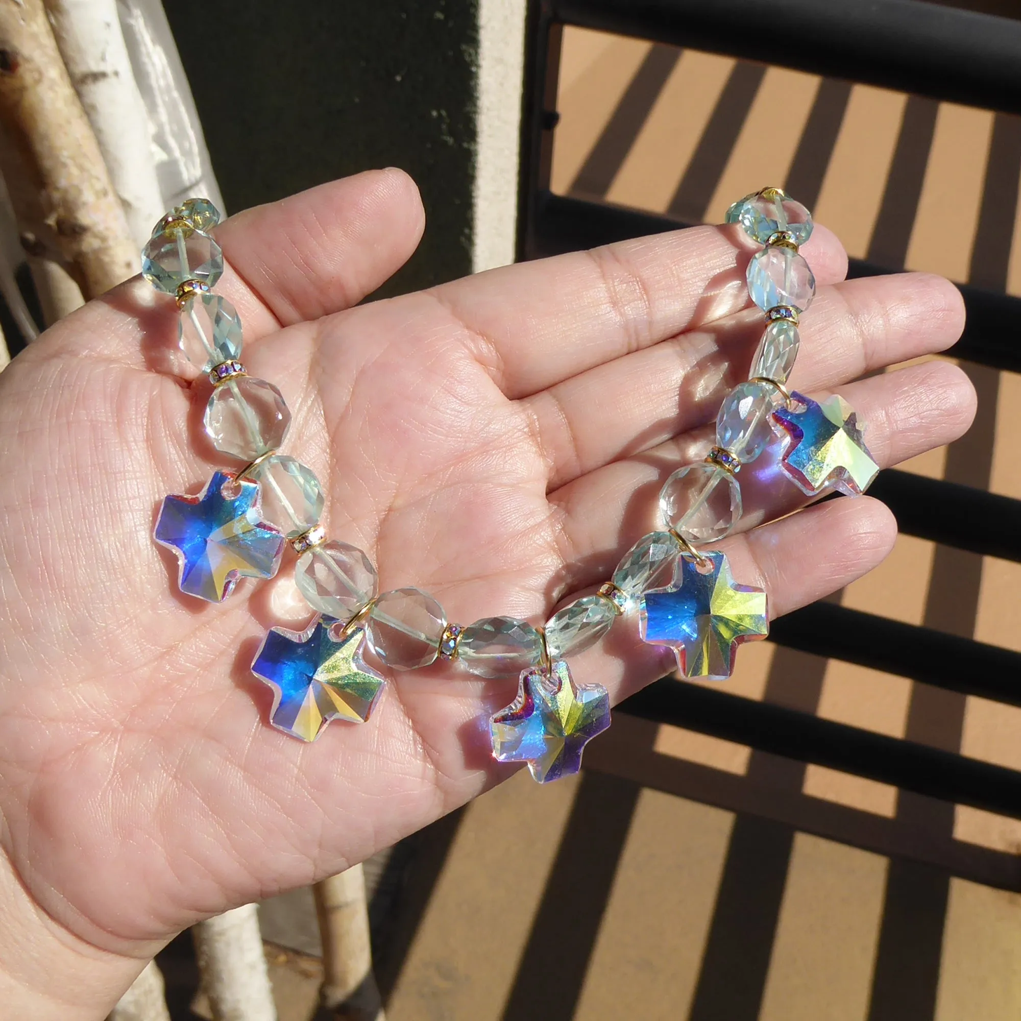 Iridescent crystal cross necklace