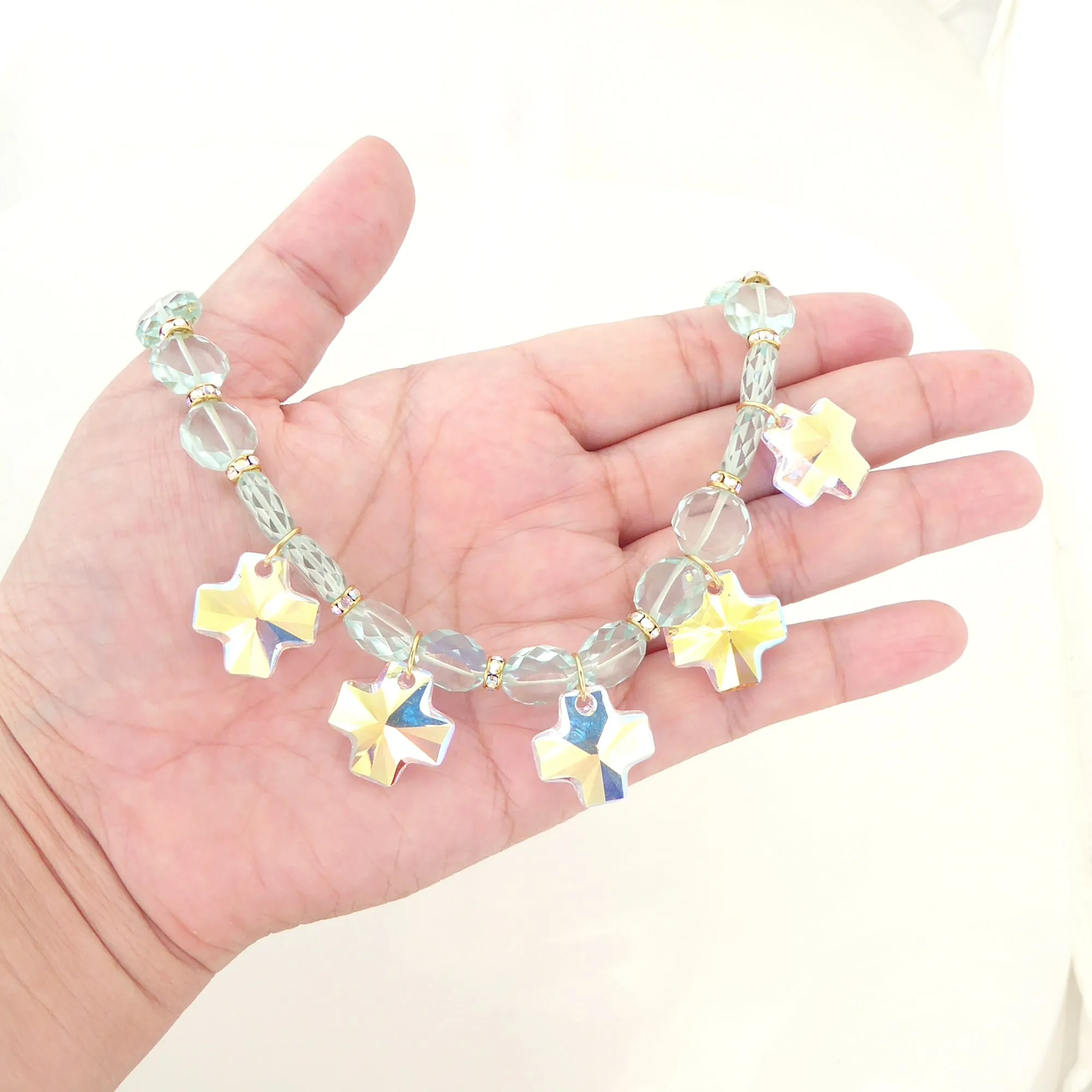 Iridescent crystal cross necklace